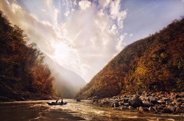 Image of sunset with raft on Karnali River in Nepal