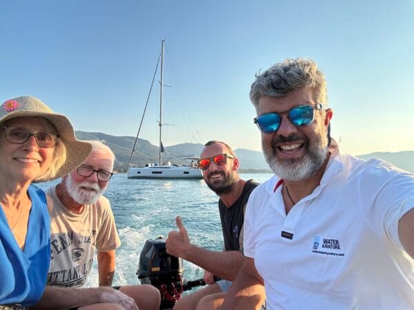 A dinghy taking guests ashore to a local taverna in Greece